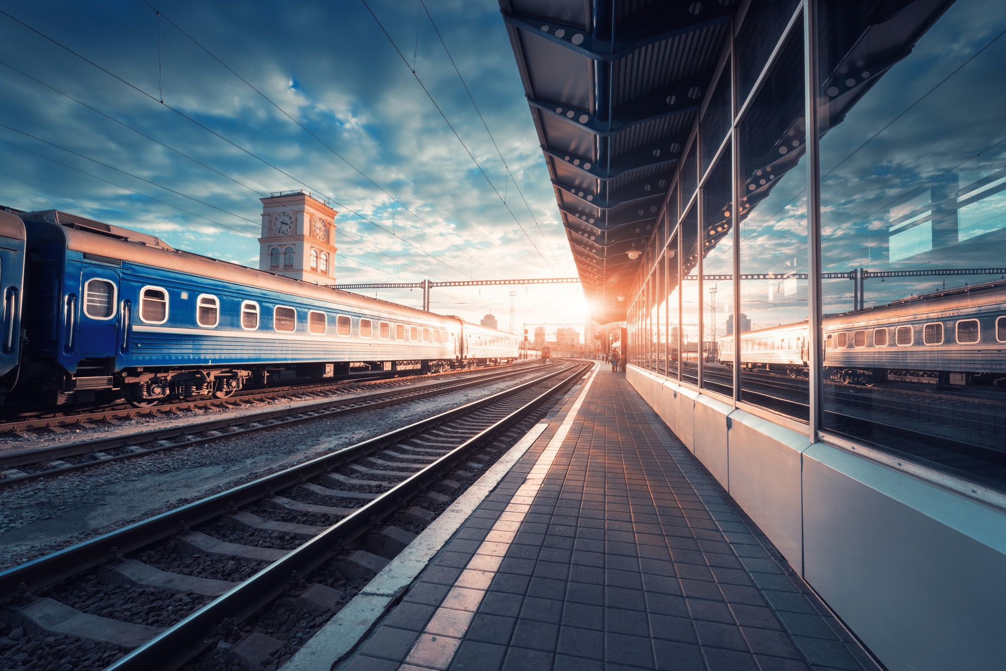 Beautiful blue passenger train at the railway station