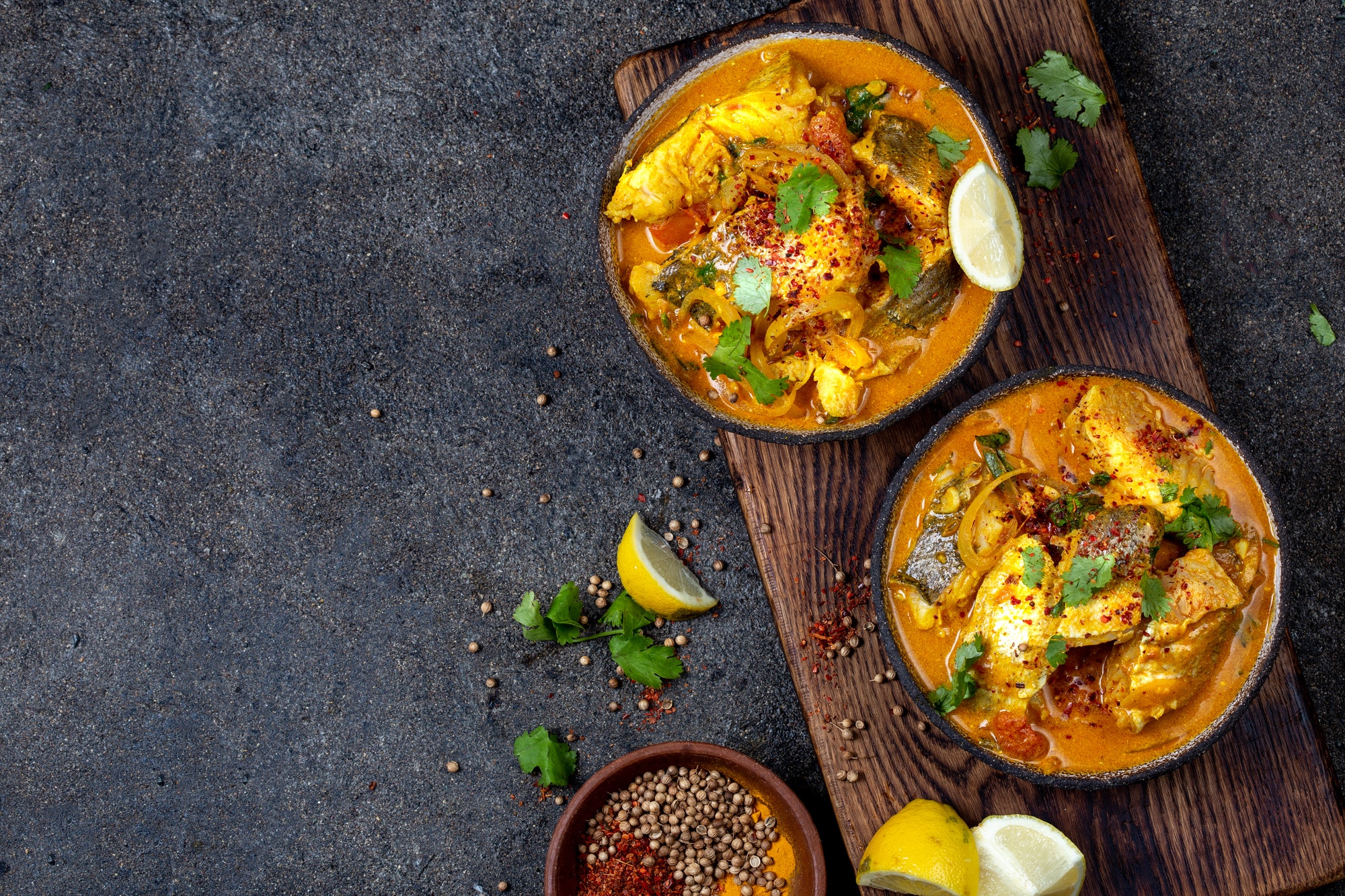 Indian Fish Curry, top view, gray background